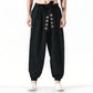 Pantalon avec ceinture noir à motifs japonais